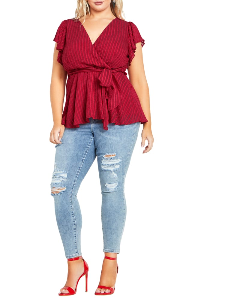 Front of a model wearing a size M Evoke Top in Love Red by City Chic. | dia_product_style_image_id:318074